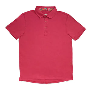 Red polo shirt on a white background