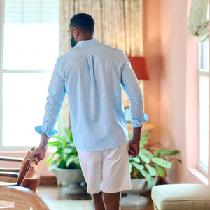 man wearing checked shirt