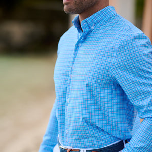 man wearing checked shirt