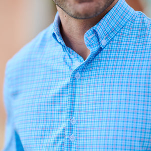 man wearing checked shirt