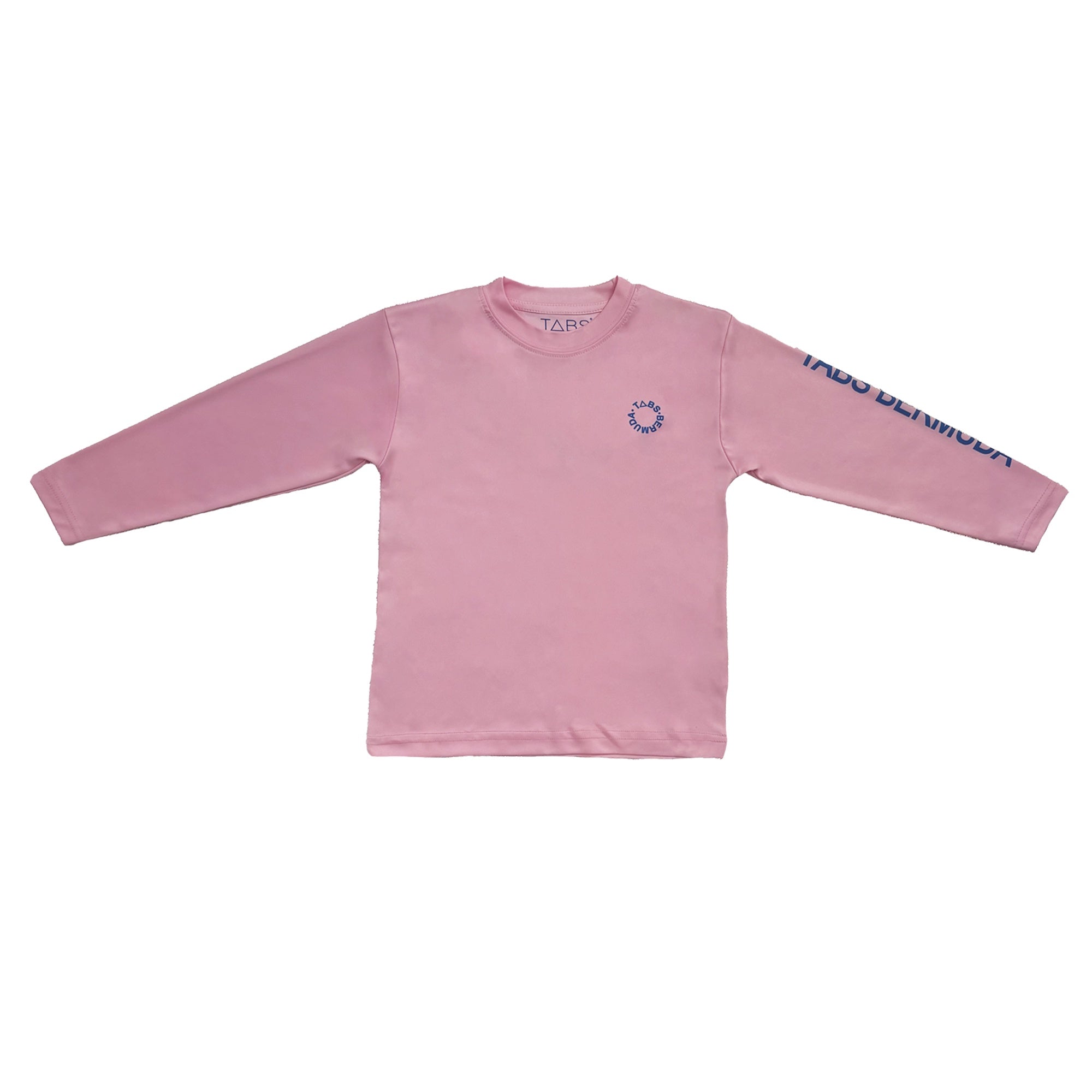 Child in pink shirt and shorts jumping into a pool with lush greenery in the background